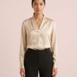 Blusa satinada champán