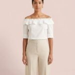 Blusa blanca de hombros descubiertos